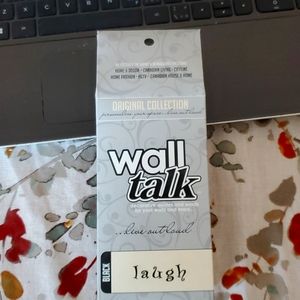 Black "laugh" decorative wall quote